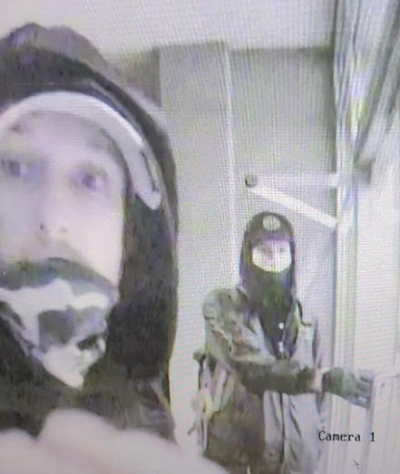 two mail theft suspects. one with camo mask, one with black mask