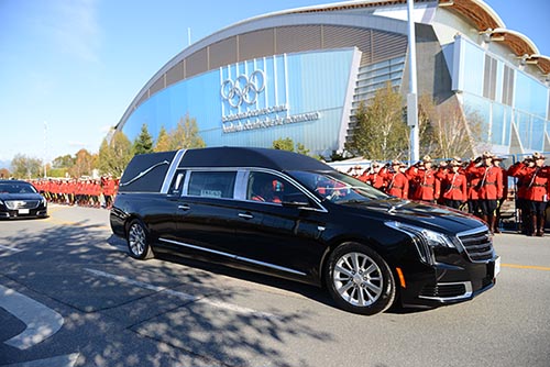 Funeral coach arriving at Richmond Oval