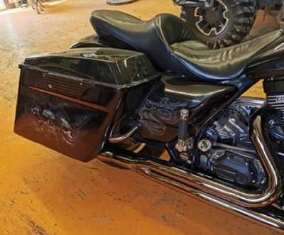 Airbrushed saddle bag and side of Harley
