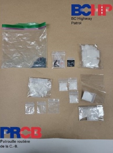 Various suspected drugs in both large and small clear plastic bags