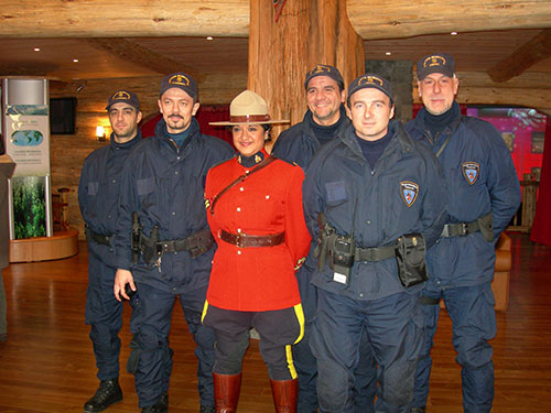 The then Corporal Nav Hothi pictured with members of the Italian police. She was part of the contingent for the Canada Pavilion during the 2006 Winter Olympics in Turin, Italy. 